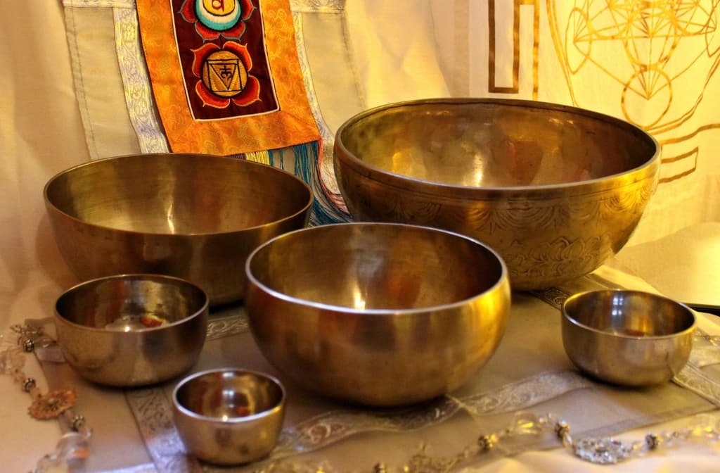 A collection of golden singing bowls